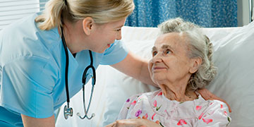 Nurse with elderly patient